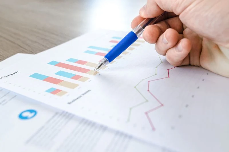 Business performance charts on a screen